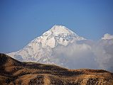 Mustang 02 02-2 Dhaulagiri Close Up From Pass After Tange Dhaulagiri�s summit pokes up above an intervening ridge at the top of the pass from Tange in Upper Mustang.